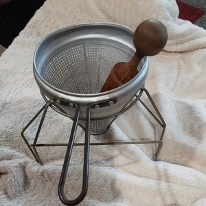 VINTAGE ALUMINUM CONE FOOD STRAINER WITH STAND AND WOOD MASHER
